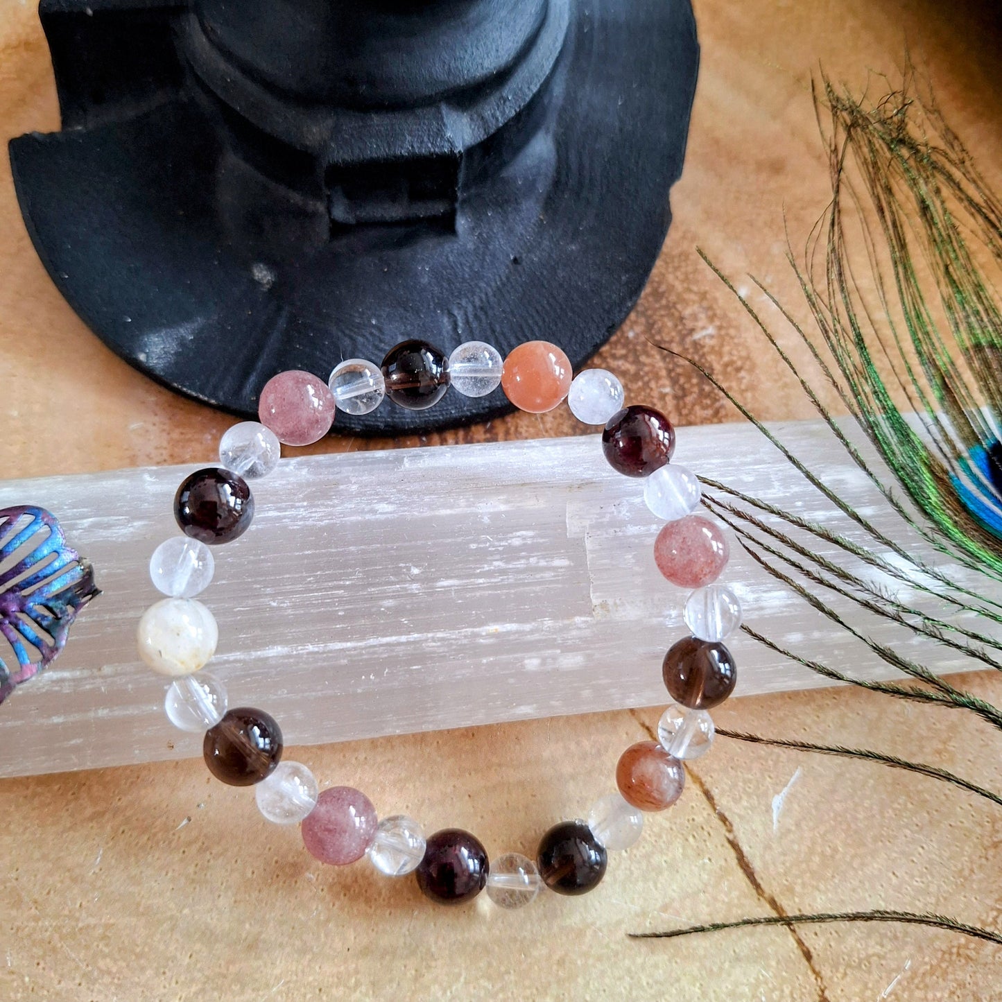 Tiredness bracelet gift for her crystal healing with Red Garnet, Clear Quartz, Moonstone, Smoky Quartz and Strawberry Quartz