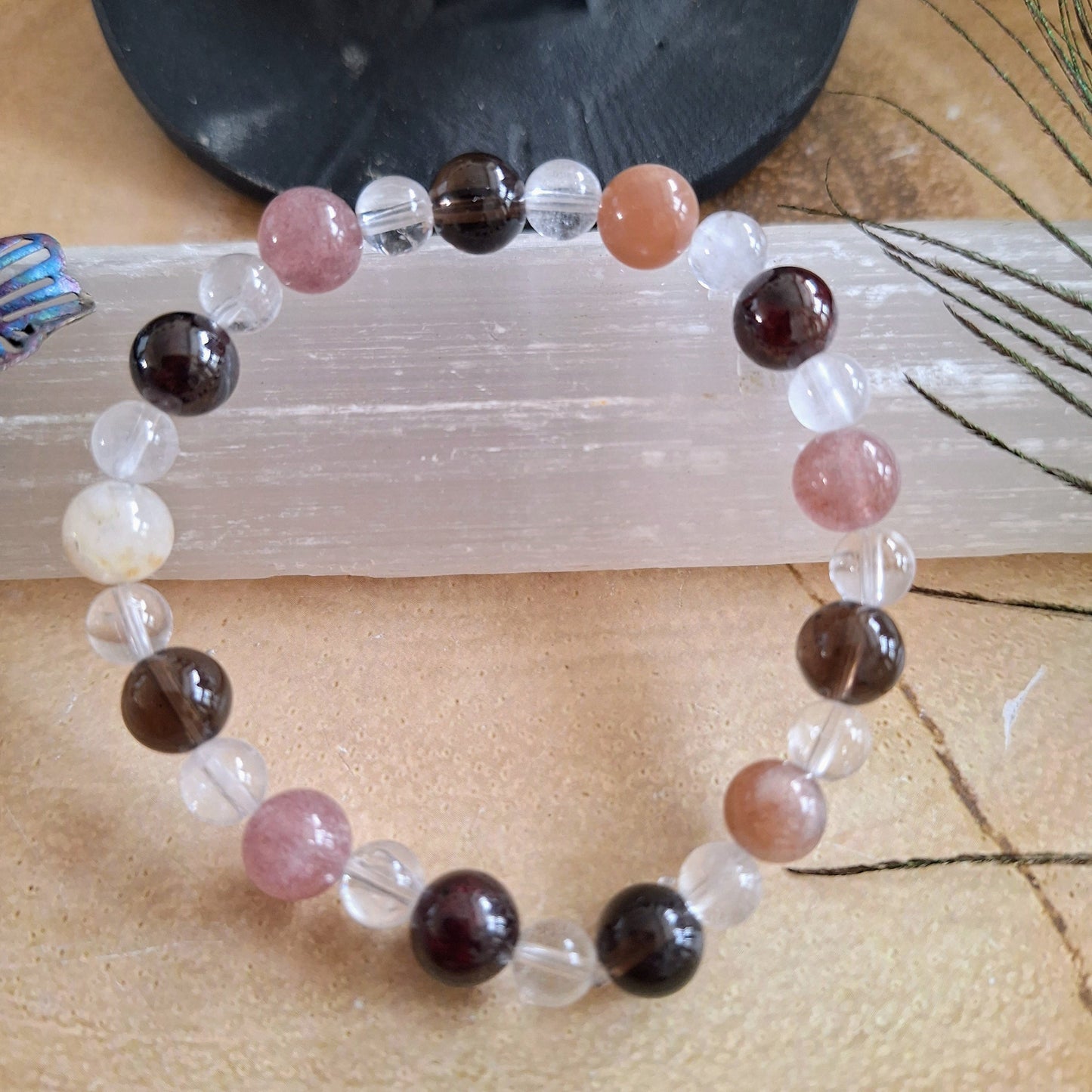 Tiredness bracelet gift for her crystal healing with Red Garnet, Clear Quartz, Moonstone, Smoky Quartz and Strawberry Quartz